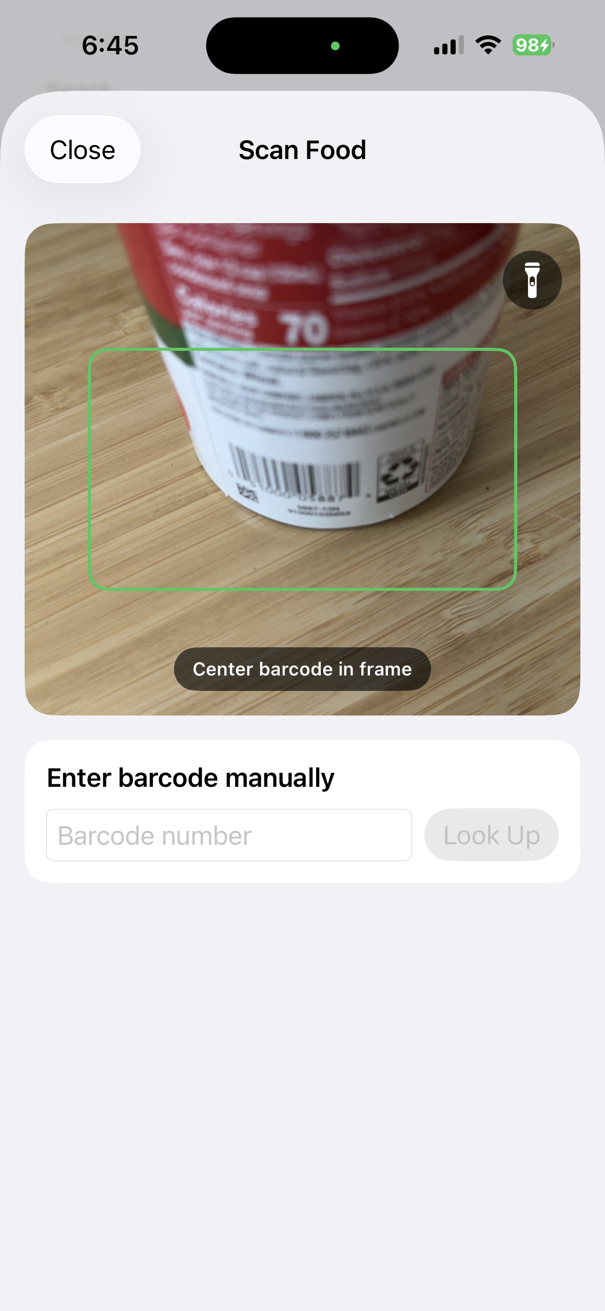 Barcode centered in the BeFit Tracker scanner on iPhone